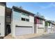 Modern townhome exterior with attached garage and unique architectural details at 1342 Rietveld Nw Row, Atlanta, GA 30318