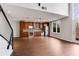 Living room featuring hardwood floors, open layout, and modern kitchen view at 1342 Rietveld Nw Row, Atlanta, GA 30318
