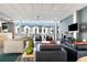Stylish living room with ample seating, a modern TV, and large windows overlooking the outdoor space at 1342 Rietveld Nw Row, Atlanta, GA 30318