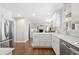 Modern kitchen with stainless steel appliances, white cabinets, and granite countertops at 922 Grandview Nw Way, Acworth, GA 30101