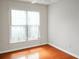 Bright bedroom with natural light streaming through the windows and hardwood flooring at 3246 Wellington Sw Walk, Atlanta, GA 30331