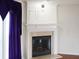 Bright living room with decorative fireplace and elegant mantel at 3246 Wellington Sw Walk, Atlanta, GA 30331