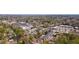 Aerial view of community near shopping with dense tree coverage in a neighborhood at 4282 Roswell Ne Rd # G1, Atlanta, GA 30342