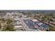 An aerial view of local real estate with retail shopping and local transit near a townhome community at 4282 Roswell Ne Rd # G1, Atlanta, GA 30342