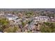 Aerial view showcasing the community near shopping and dense tree coverage at 4282 Roswell Ne Rd # G1, Atlanta, GA 30342