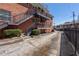 Brick apartment building exterior with black stairs and parking at 4282 Roswell Ne Rd # G1, Atlanta, GA 30342