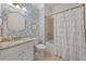Charming bathroom with blue wallpaper and white vanity at 4467 Sterling Pointe Nw Dr, Kennesaw, GA 30152