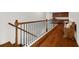 Second story hallway featuring hardwood floors and wood railing at 4467 Sterling Pointe Nw Dr, Kennesaw, GA 30152