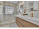 Stunning bathroom featuring a double sink vanity, glass shower, and modern fixtures at 2461 Lakebrooke Dr, Marietta, GA 30066