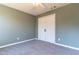 Bedroom boasts neutral carpet and paint, offering a blank canvas for personalization at 25 Shadowbrook Ct, Covington, GA 30014