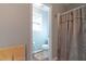 Bright toilet featuring laminate floors and blue painted walls at 25 Shadowbrook Ct, Covington, GA 30014