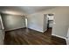 Spacious living room featuring wood floors and neutral tones, creating a calming environment at 110 Raymond St, Jonesboro, GA 30236