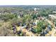 Aerial view of the neighborhood with lush trees at 1897 De Winton Pl, Lawrenceville, GA 30043