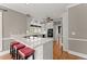 Bright kitchen featuring a countertop with barstool seating and stainless steel appliances at 1897 De Winton Pl, Lawrenceville, GA 30043