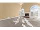 Bright living room with fireplace, large windows, and neutral carpet at 1897 De Winton Pl, Lawrenceville, GA 30043