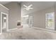 Spacious main bedroom featuring a fireplace and large windows at 1897 De Winton Pl, Lawrenceville, GA 30043