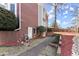 Landscaped sideyard with hardscape walkway at 1897 De Winton Pl, Lawrenceville, GA 30043