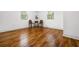 Bright living room with freshly painted walls and hardwood floors at 658 Woods Dr, Atlanta, GA 30318