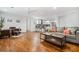 Open living room with hardwood floors, modern decor, and great lighting at 658 Woods Dr, Atlanta, GA 30318