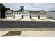 Exterior view of new townhomes with garages at 8666 Webb Rd, Riverdale, GA 30274