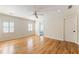 Large bedroom with wood floors and multiple windows with blinds at 111 Paces Run, Atlanta, GA 30339