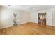 Spacious bedroom with hardwood floors and access to bathroom and laundry at 111 Paces Run, Atlanta, GA 30339