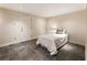 Cozy bedroom with unique tile flooring, natural light, and a comfortable bed at 111 Paces Run, Atlanta, GA 30339