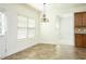 Dining area features tile floors and a chandelier at 3129 Arbor Oaks Dr, Snellville, GA 30039