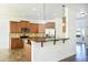 Eat-in kitchen featuring stainless steel appliances, granite countertops, and ample cabinet space at 3129 Arbor Oaks Dr, Snellville, GA 30039