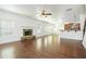 Bright living room with hardwood floors, stone fireplace, and open floor plan at 3129 Arbor Oaks Dr, Snellville, GA 30039