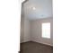 Cozy bedroom featuring plush carpeting and a bright window, perfect for relaxation at 83 Nyishol Way, Dallas, GA 30157
