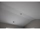 Image featuring a white vaulted ceiling with beam, light, and vent at 83 Nyishol Way, Dallas, GA 30157