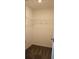 Bright walk-in closet featuring built-in wire shelving for organization at 83 Nyishol Way, Dallas, GA 30157
