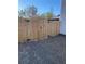 The backyard features a wood fence with a gate to provide privacy at 83 Nyishol Way, Dallas, GA 30157