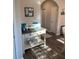 Entryway table with decorative accessories and view of doorways at 83 Nyishol Way, Dallas, GA 30157