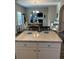 Kitchen island with granite countertops and seating area, perfect for entertaining at 83 Nyishol Way, Dallas, GA 30157