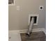 A laundry room with connections and shelving at 83 Nyishol Way, Dallas, GA 30157