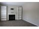 Spacious living room with modern fireplace and carpet at 83 Nyishol Way, Dallas, GA 30157