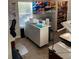Functional office space with storage cabinets, desks, and a large window at 83 Nyishol Way, Dallas, GA 30157