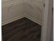 Walk-in pantry with wire shelving and wood-style flooring at 83 Nyishol Way, Dallas, GA 30157