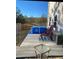 Relaxing poolside setting with a refreshing above-ground pool, seating, and tranquil scenery at 83 Nyishol Way, Dallas, GA 30157
