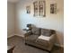 Small seating area with comfortable love seat at 83 Nyishol Way, Dallas, GA 30157
