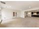 Spacious basement featuring neutral carpet, recessed lighting and french doors to the exterior at 2250 Blackheath Trce, Alpharetta, GA 30005