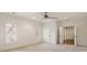 Bright, spacious bedroom with carpet, plantation shutters, and a ceiling fan at 2250 Blackheath Trce, Alpharetta, GA 30005