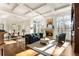 Open concept living room features hardwood floors, fireplace, and lots of natural light at 2250 Blackheath Trce, Alpharetta, GA 30005