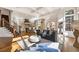 Open-concept living area flows into a custom kitchen with natural light and inviting atmosphere at 2250 Blackheath Trce, Alpharetta, GA 30005