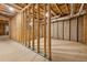 Unfinished basement with exposed framing and concrete floor at 4333 Rickenbacker Ne Way, Atlanta, GA 30342