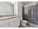 Modern bathroom features a spacious shower, stone tiling, and a sleek vanity creating a spa-like retreat at 4333 Rickenbacker Ne Way, Atlanta, GA 30342