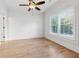 Spacious bedroom with hardwood floors, neutral walls, and large windows providing ample natural light and ventilation at 4333 Rickenbacker Ne Way, Atlanta, GA 30342