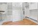This custom walk-in closet has built-in shelving, cabinets and drawers for maximum storage at 4333 Rickenbacker Ne Way, Atlanta, GA 30342